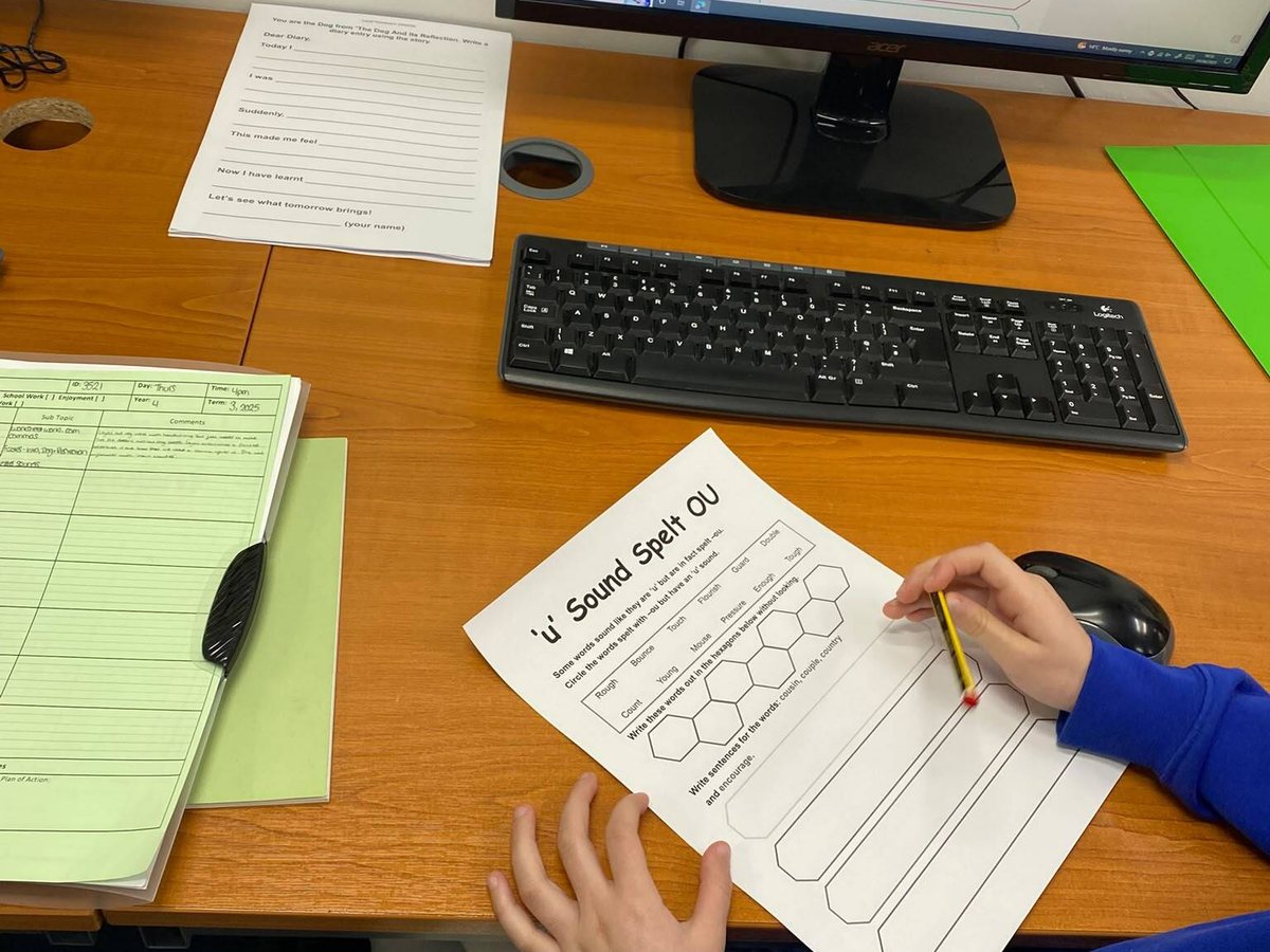 A student completing an English spelling exercise at StudyBox Sutton